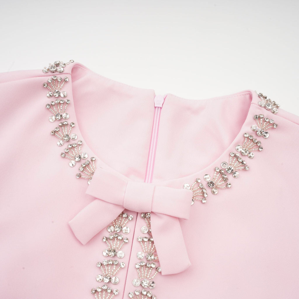 Cassi kristal detaylı pembe fiyonk midi elbise