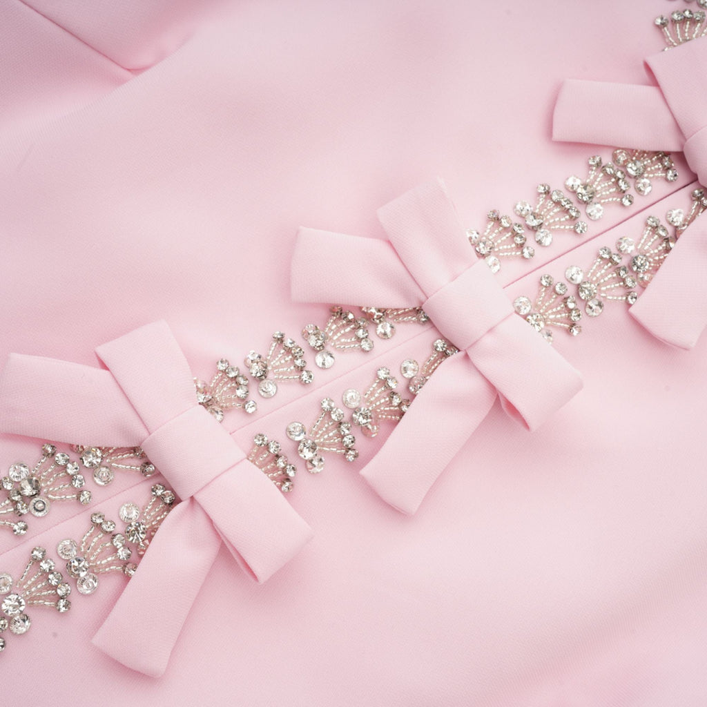 Cassi kristal detaylı pembe fiyonk midi elbise